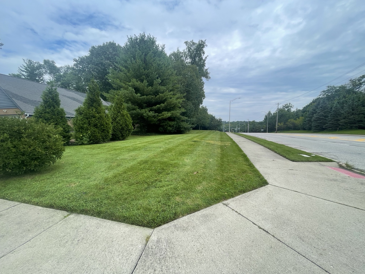 Long commercial lawn area after mowing