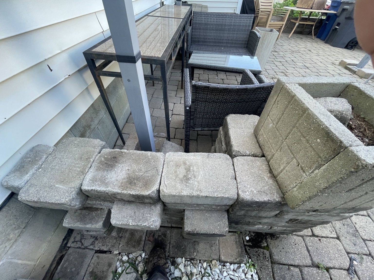 Unstable patio wall before repair