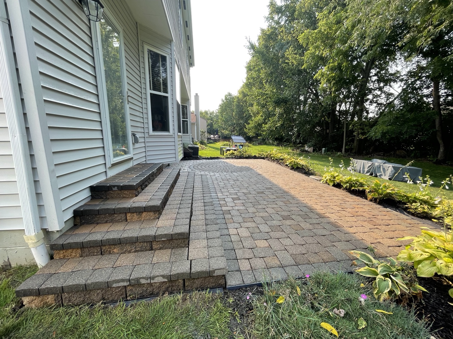Clean paver patio after pressure washing